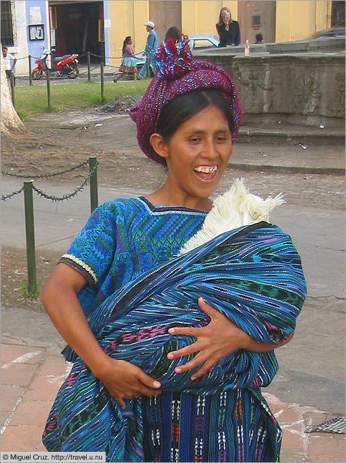 Guatemala: Antigua: Indigenous woman with child