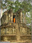 Monk surveying Bayon temple