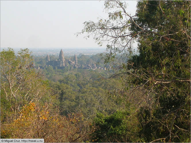 Cambodia: Siem Reap and Angkor Wat: Angkor Wat through the trees from Phnom Bakheng