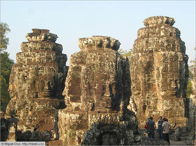 Cambodia: Siem Reap and Angkor Wat: Bayon heads and tourists