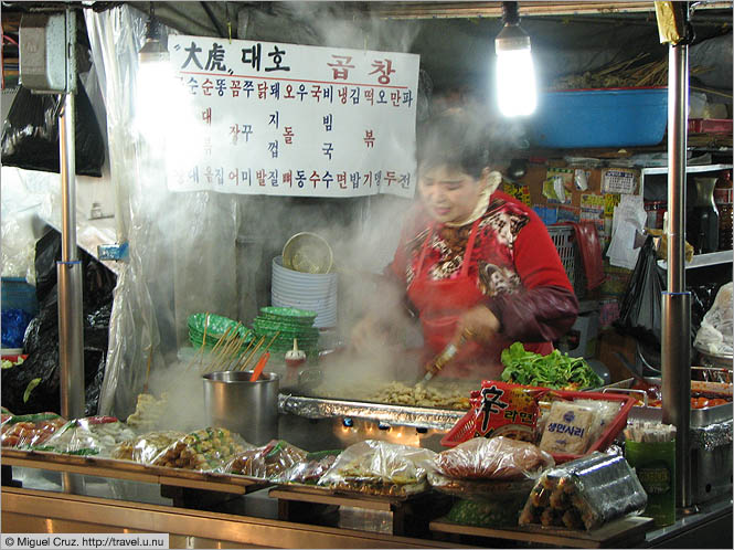 South Korea: Seoul: Food vendor outside Pungmul flea market