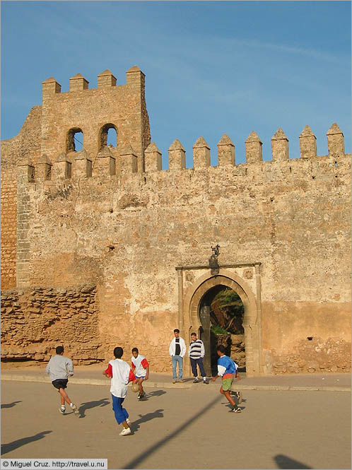 Morocco: Rabat: Football by the city walls