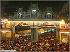 Crowds streaming through the gates