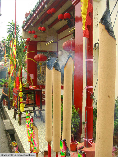 Malaysia: Malacca: Incense burning in front of the temple