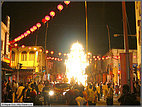 The chariot passes through Chinatown