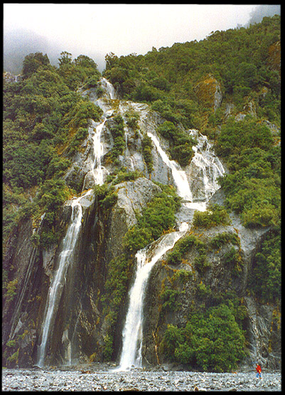 New Zealand: South Island: Waterfall near Franz Josef Glacier