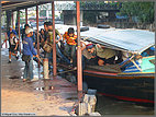 Rushing off the klong boat