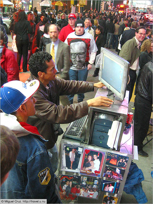 United States: New York City: High-tech photographer in Times Square